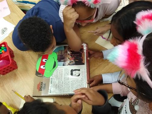 Students read about Raphael 